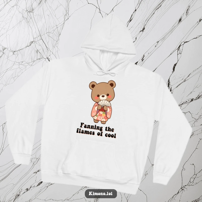 Funny bear in an elegant floral kimono holding a delicate fan, cozy hoodie art.